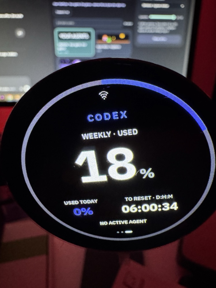 Owner photograph of the round 1.75-inch VibePulse display showing live Codex usage